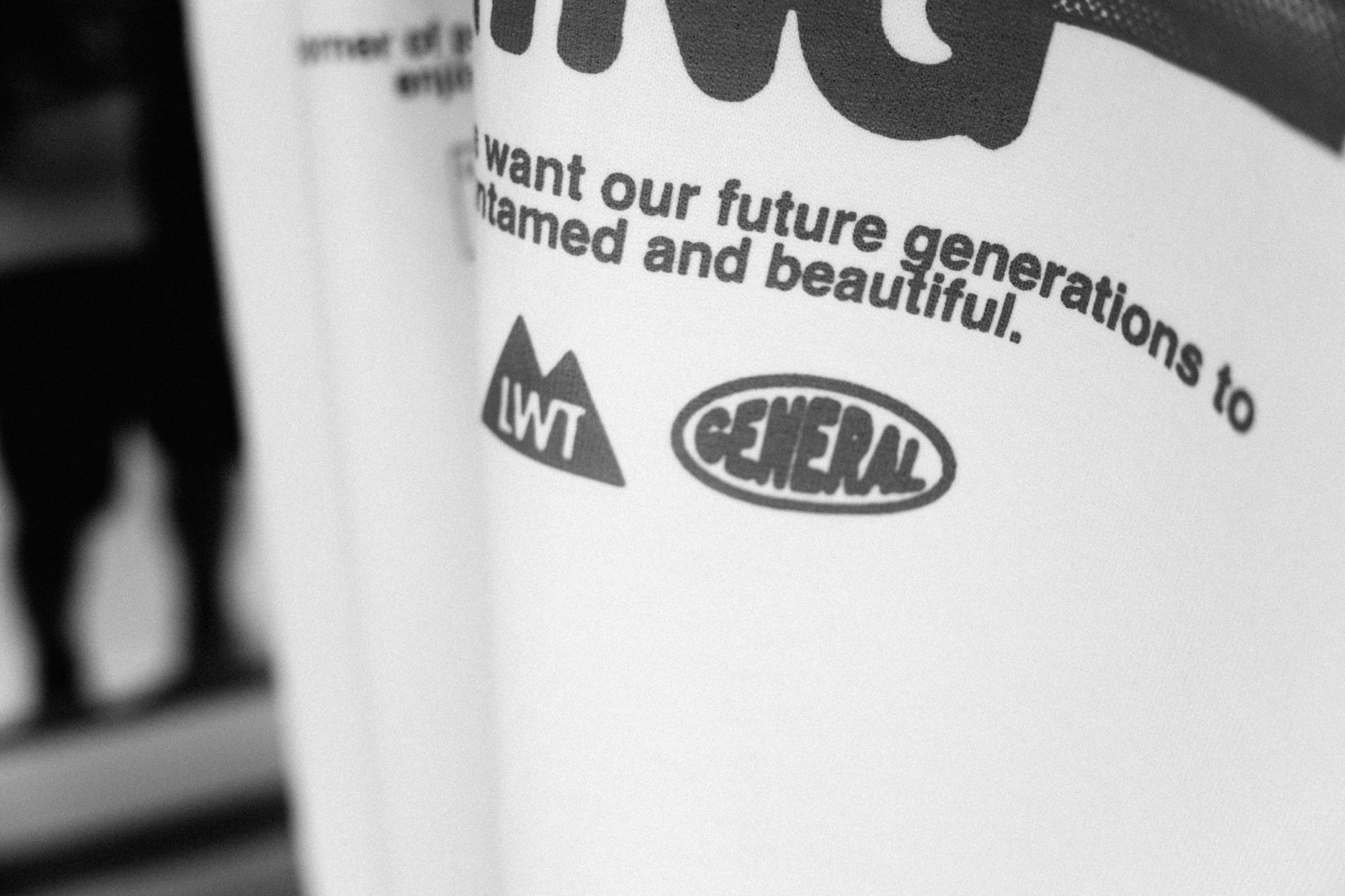 Text on the back of a t-shirt.