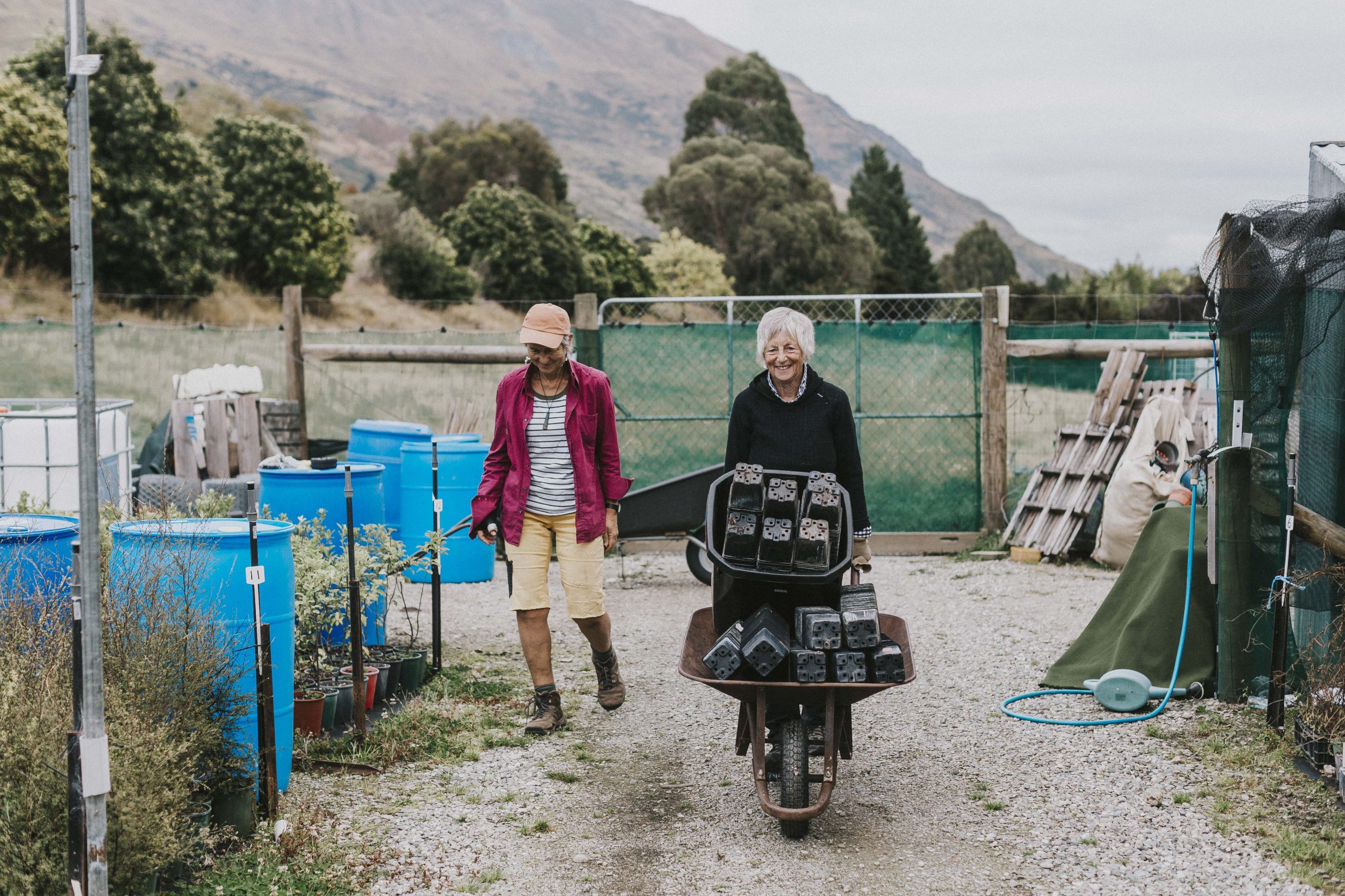Two women volunteering at Te kakano nursery in Wanaka New Zealand