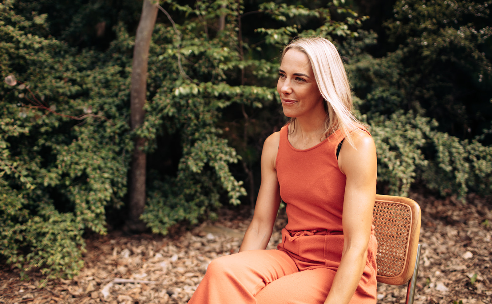Woman sitting on chair speaking