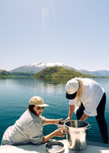 WAI volunteers on boat testing for microplastics in Lake Wānkaa