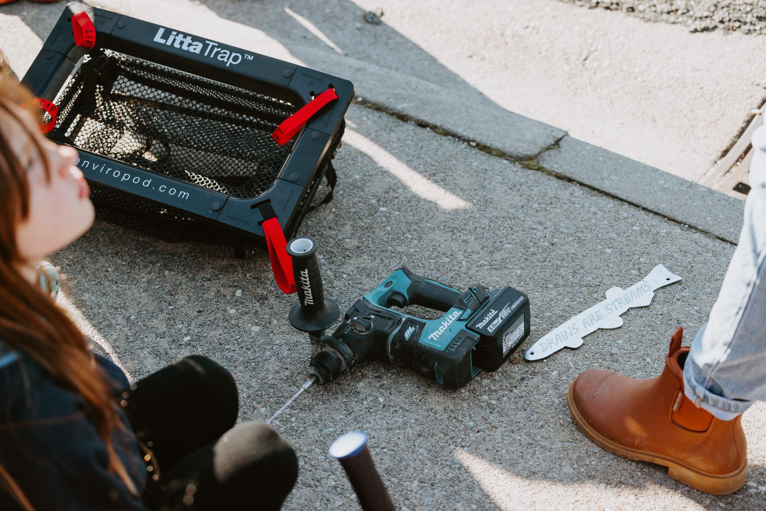 LittaTrap stormwater filter and tools used to install 'Drains are Streams' markers as part of WAI Wānaka's water protection initiative